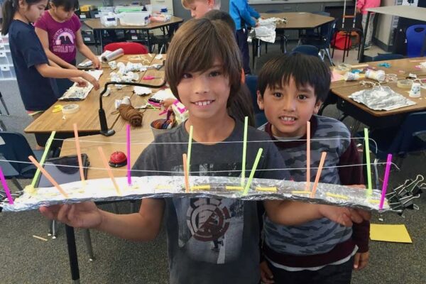 Boys Showing a Creation