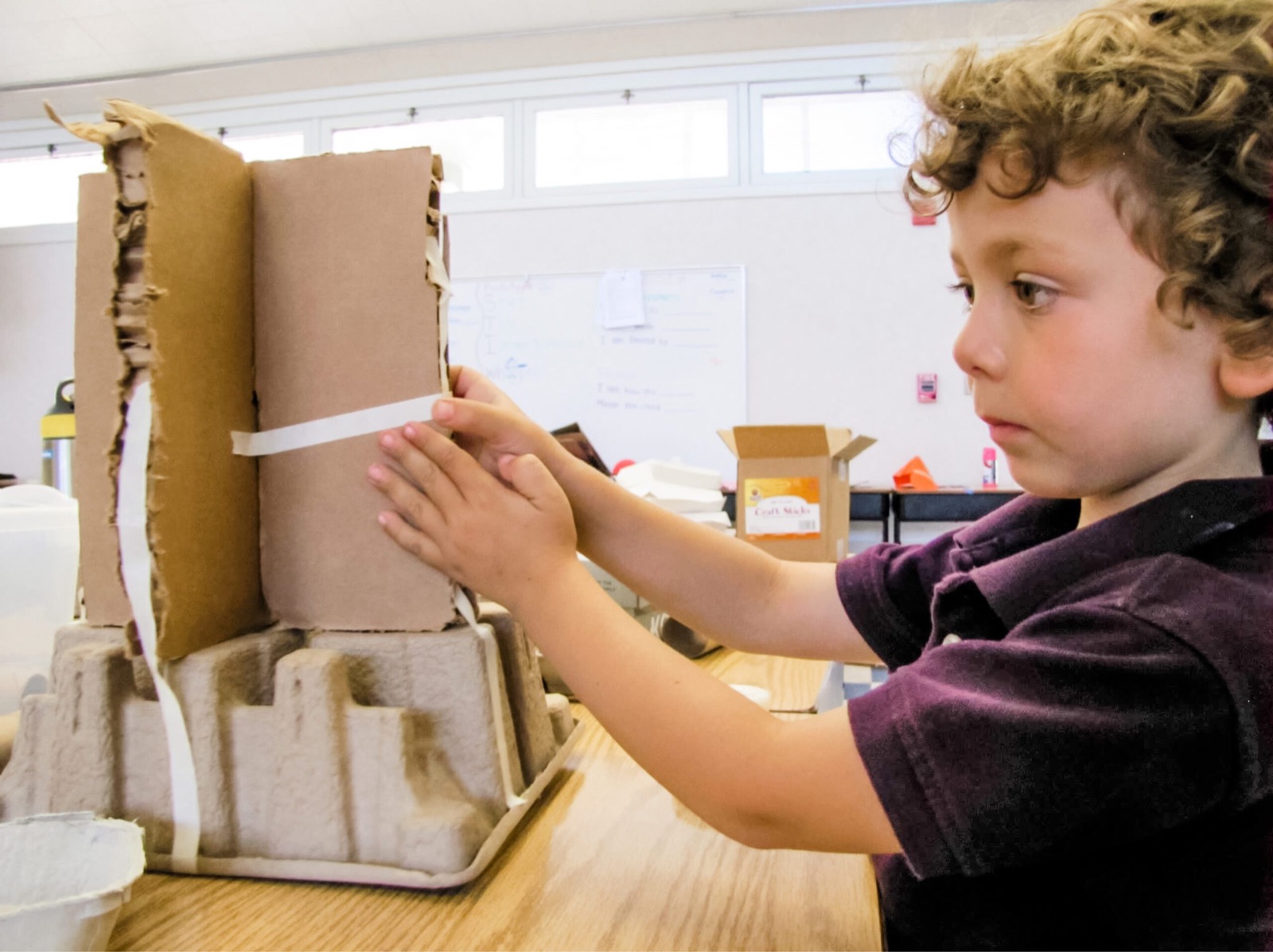 A student with an engineering build